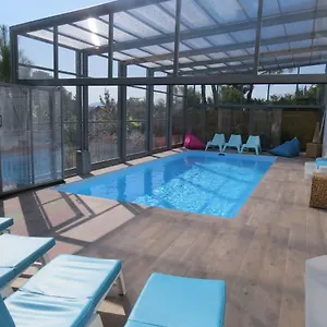 12 Pers Climatisée, Piscine Chauffée Couverte Ou Non,2km Mer, Golf, Jardin Hébergement de vacances